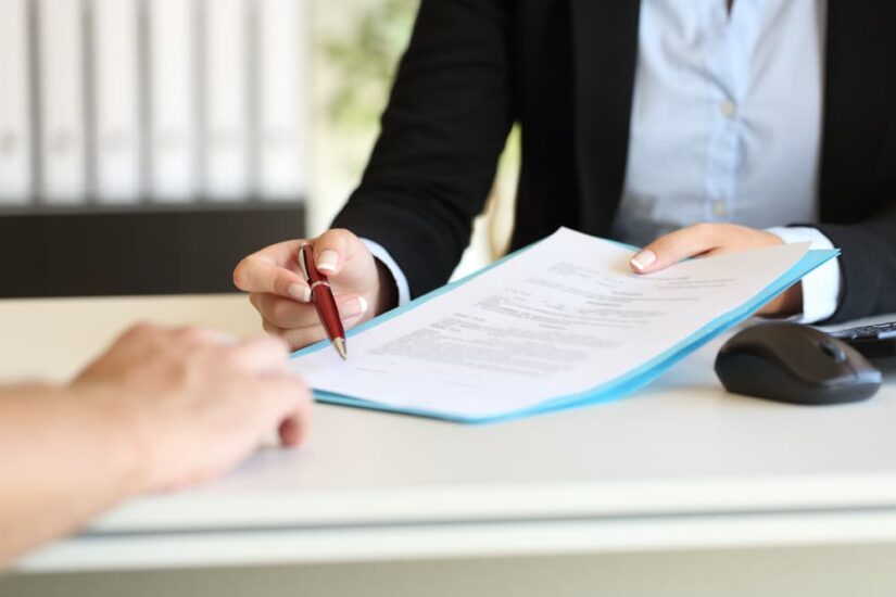 Attorney showing a document to the client