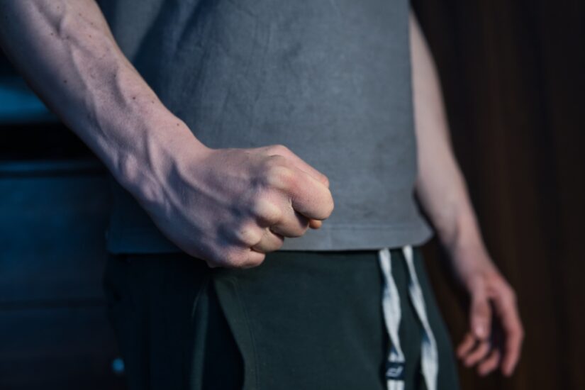 The fist of an aggressive man. a concept showing violence against people