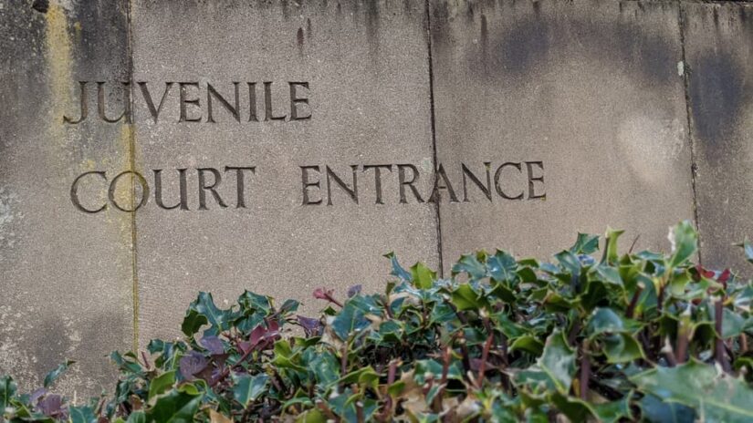 Juvenile Court Entrance written on a wall
